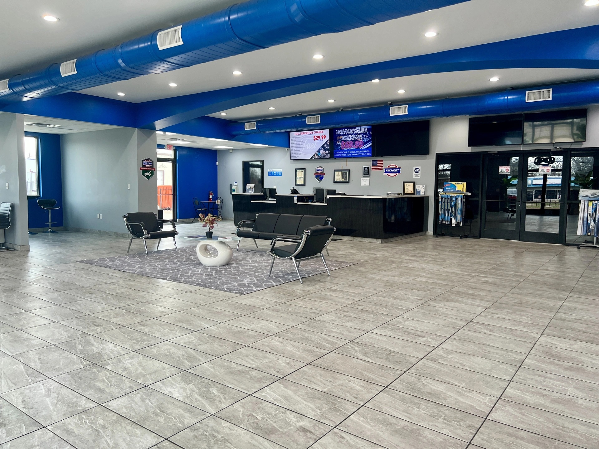 Firestone Buckner auto repair shop reception area with waiting seating and service counter